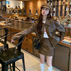 High-End อเมริกันแจ็คเก็ตหนังผู้หญิงสั้นสไตล์ Non-Cracking หนัง All-Match หลวมรถจักรยานยนต์แจ็คเก็ตหนังแฟชั่น