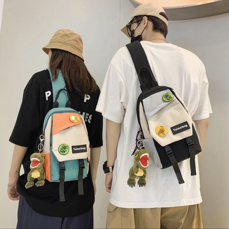 สไตล์เกาหลีอินเทรนด์ ค โรสบอดี กระเป๋าสําหรับคู่รักญี่ปุ่นย้อนยุคกีฬาเอวแฟชั่นใหม่ของผู้หญิงสบายๆอเนกประสงค์นักเรียนไหล่