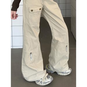 กางเกงยีนส์ชุดทำงานแบบขากระดิ่งหลวมสีเม็ดมะม่วงสไตล์ไฮสตรีทซักฟอกสำหรับผู้หญิง