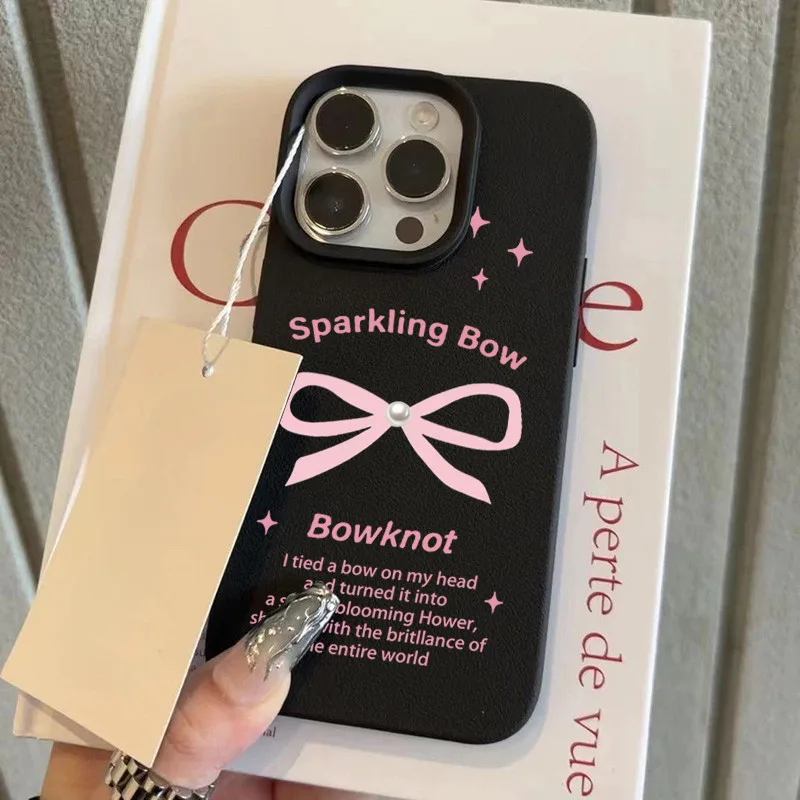 เคสโทรศัพท์มือถือหนังคุณภาพสูงป้องกันลื่น for iPhone11 12 13 14 15 16Pro Max XR XS X 7/8Pผูกโบว์ยาวสีชมพู